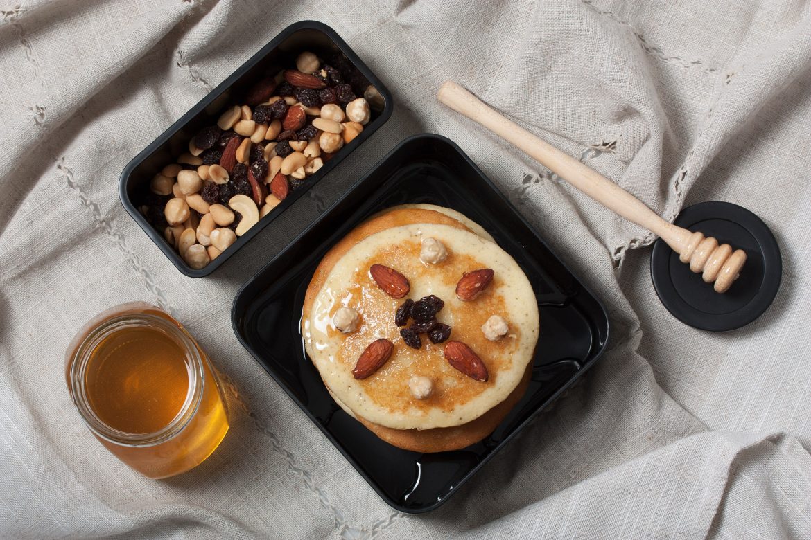 Pancakes with honey and dry fruits